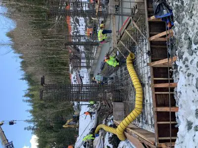 Construction crews working in snowy conditions