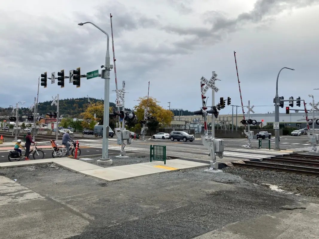 Railroad crossing with bikes waiting