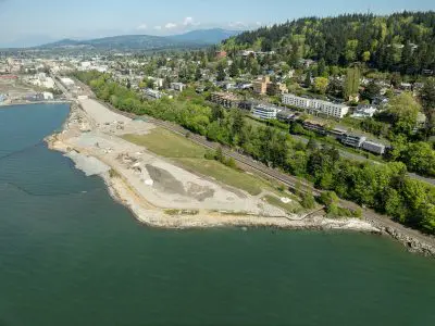 Aerial view of waterfront construction site on sunny day