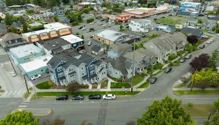 An aerial photo shows townhouses at the corner of Peabody and Broadway in Bellingham