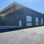Storage building with vehicle bays
