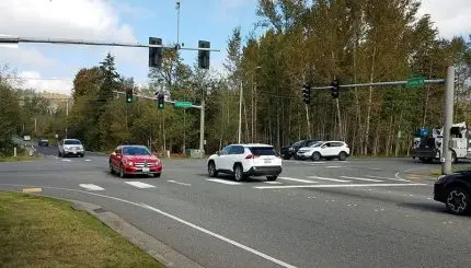 cars at traffic light intersection