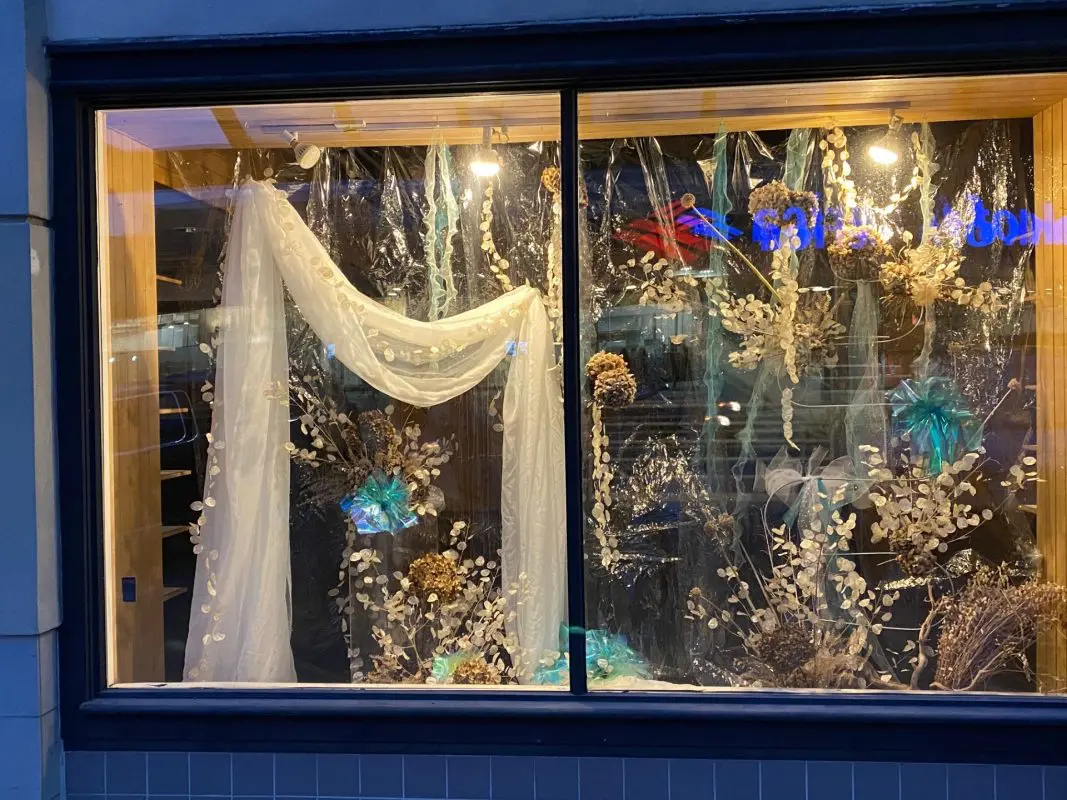 Flower arrangement in window