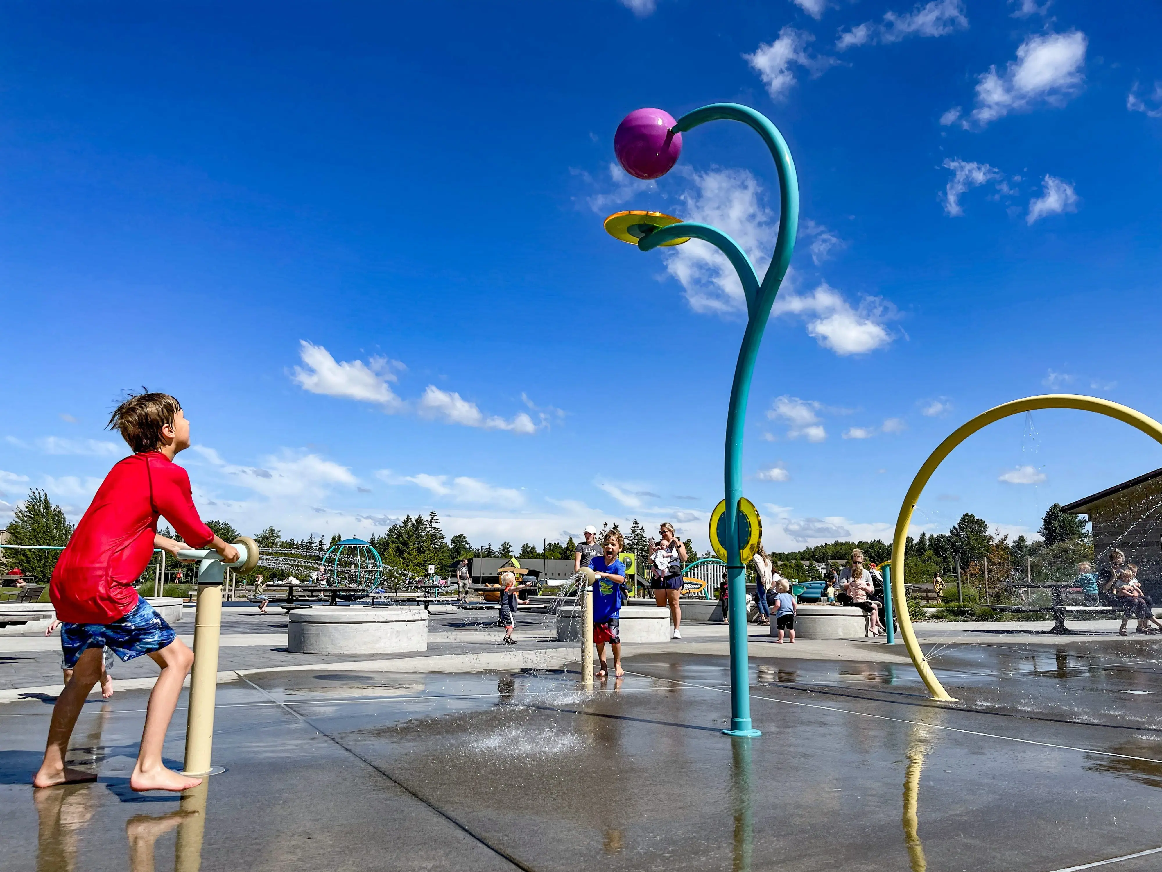 Kids play in a spray park