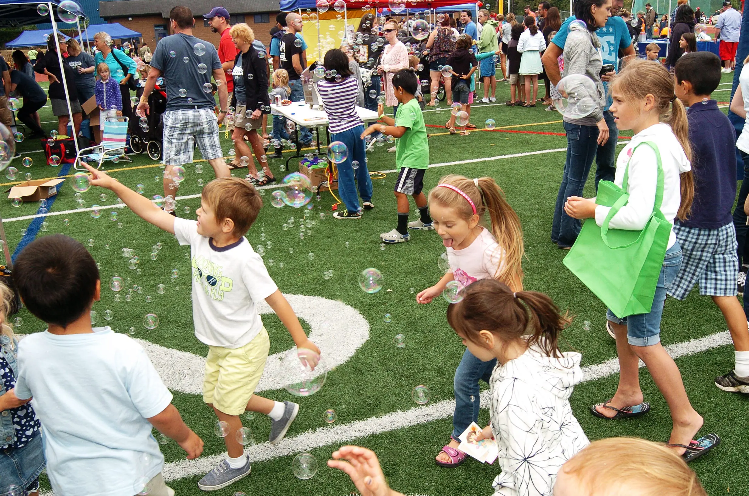 Kids playing with bubbles