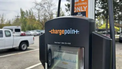 An EV charging station in a parking lot
