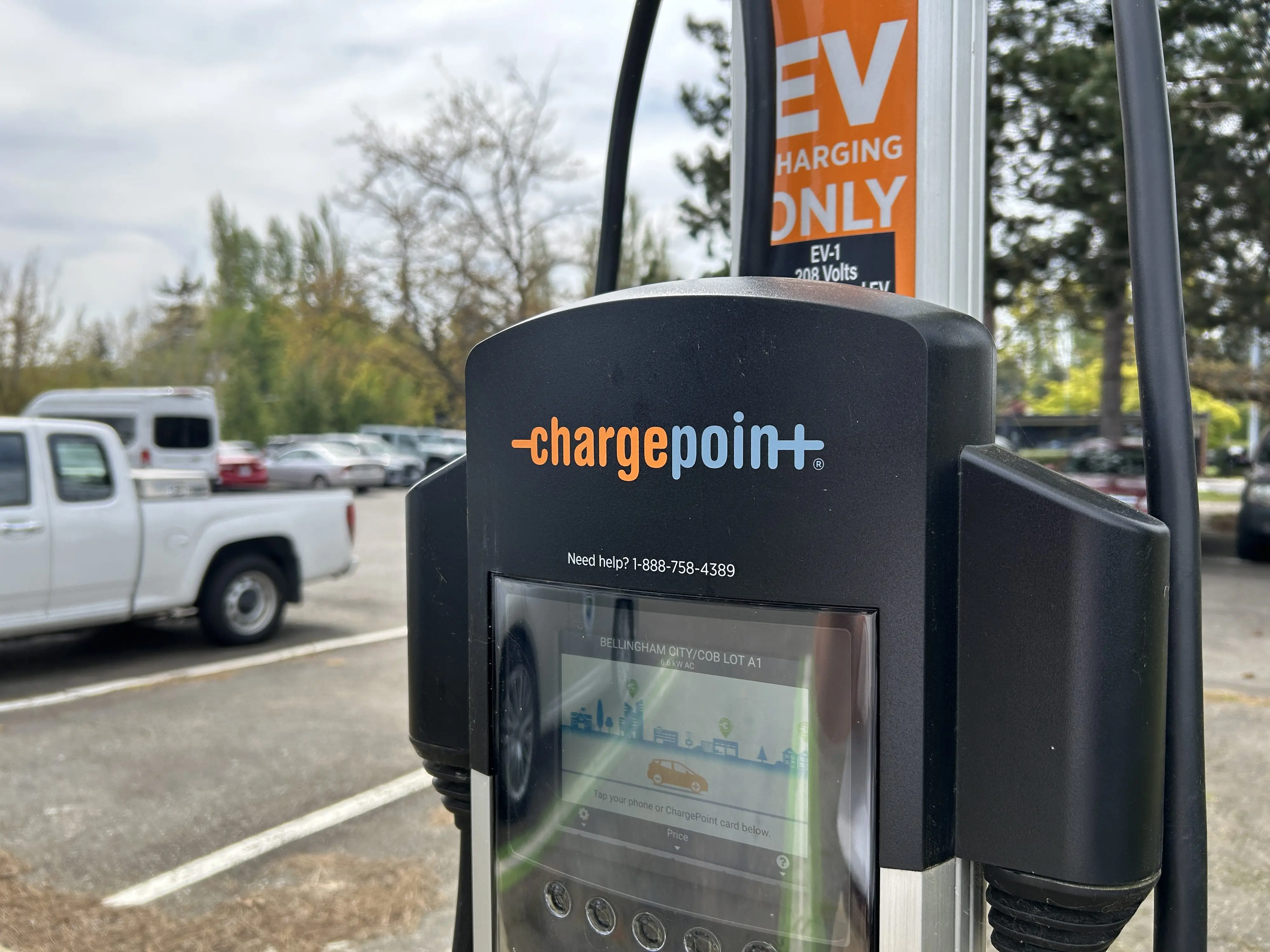 An EV charging station in a parking lot