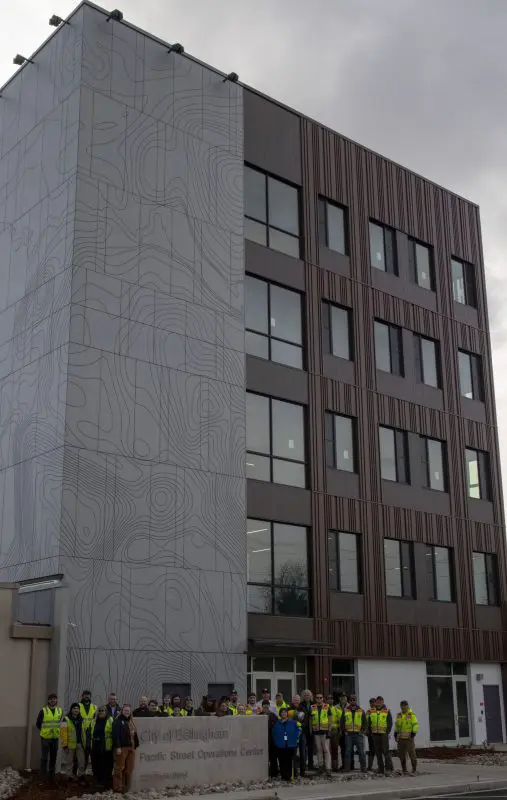 Five-story building with cloudy background