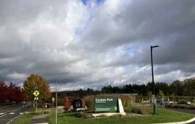 Large sign reading &quot;Cordata Park: South Entrance&quot;