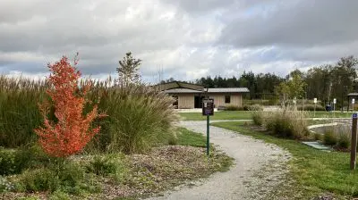 Walking path leading to covered park pavilion
