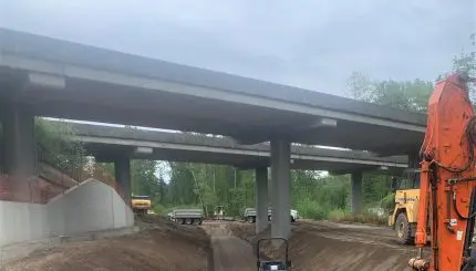 Orchard connector workers along smooth dirt road