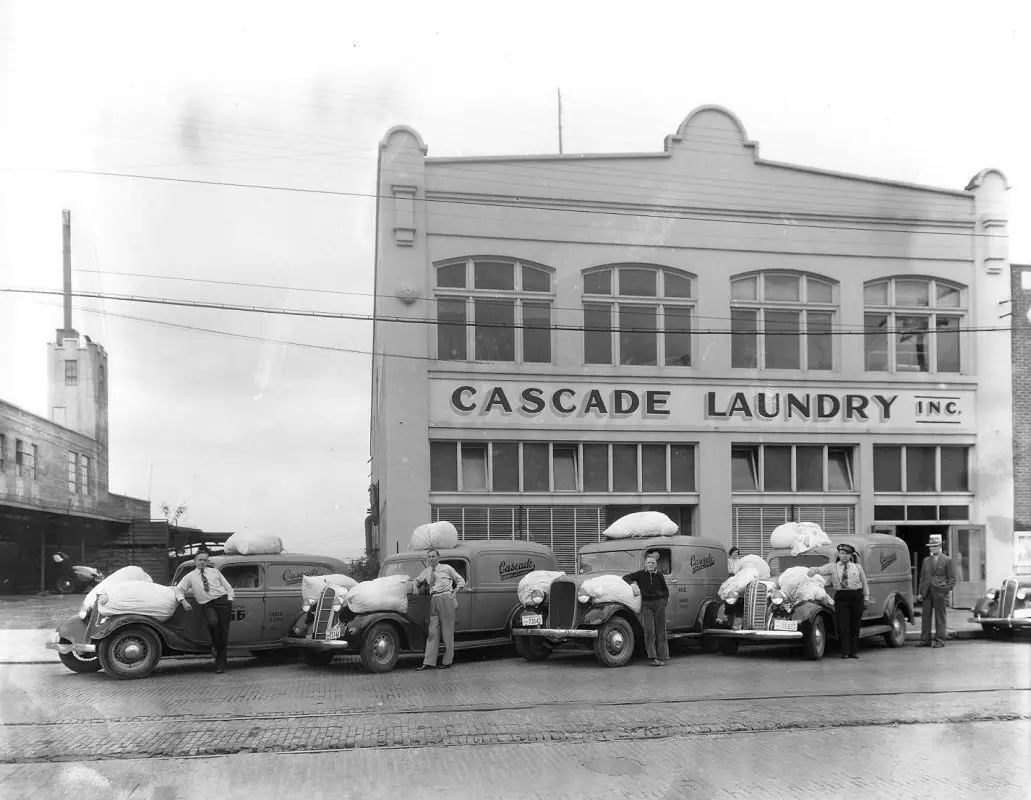A black and white historic photo of a building at 207 Prospect Street.