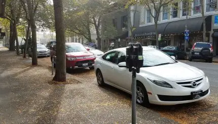 Parking meters and cars parked in downtown Bellingham