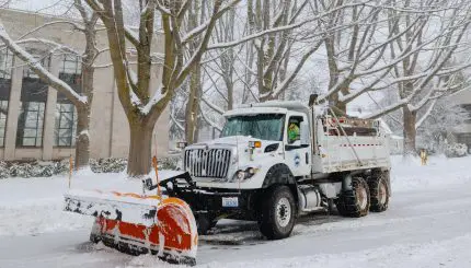 Snowplow on snow-covered street
