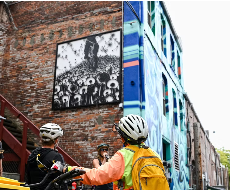 Art on the wall of a building in the Commercial Street alley.