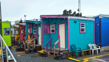Colorful tiny homes in one of the tiny home villages operated by HomesNOW! in Bellingham.
