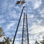 Tall metal tower with crane