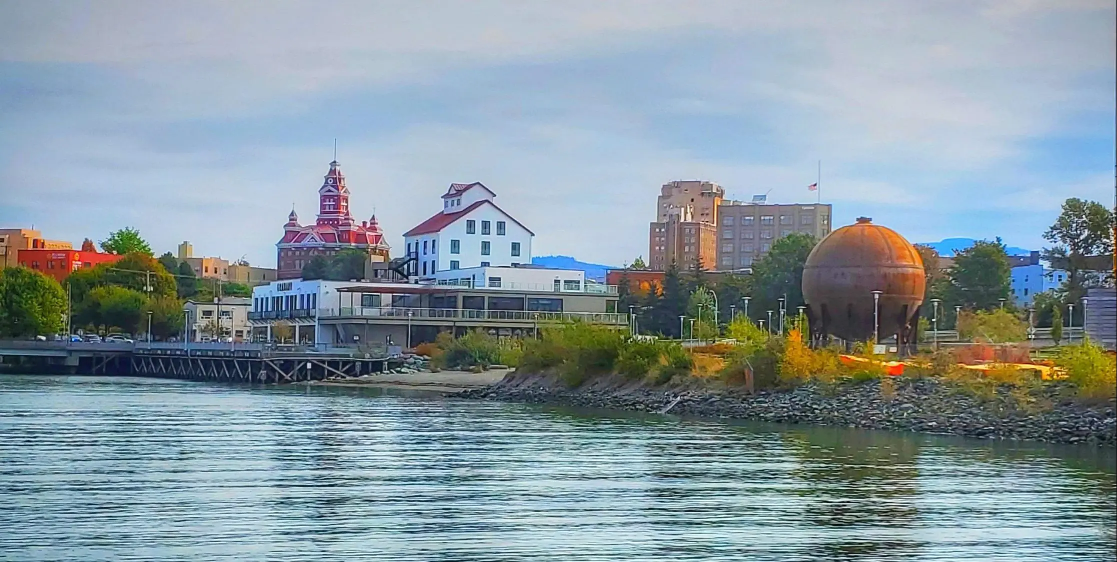 A photo of Waterfront Park with City Hall in the background