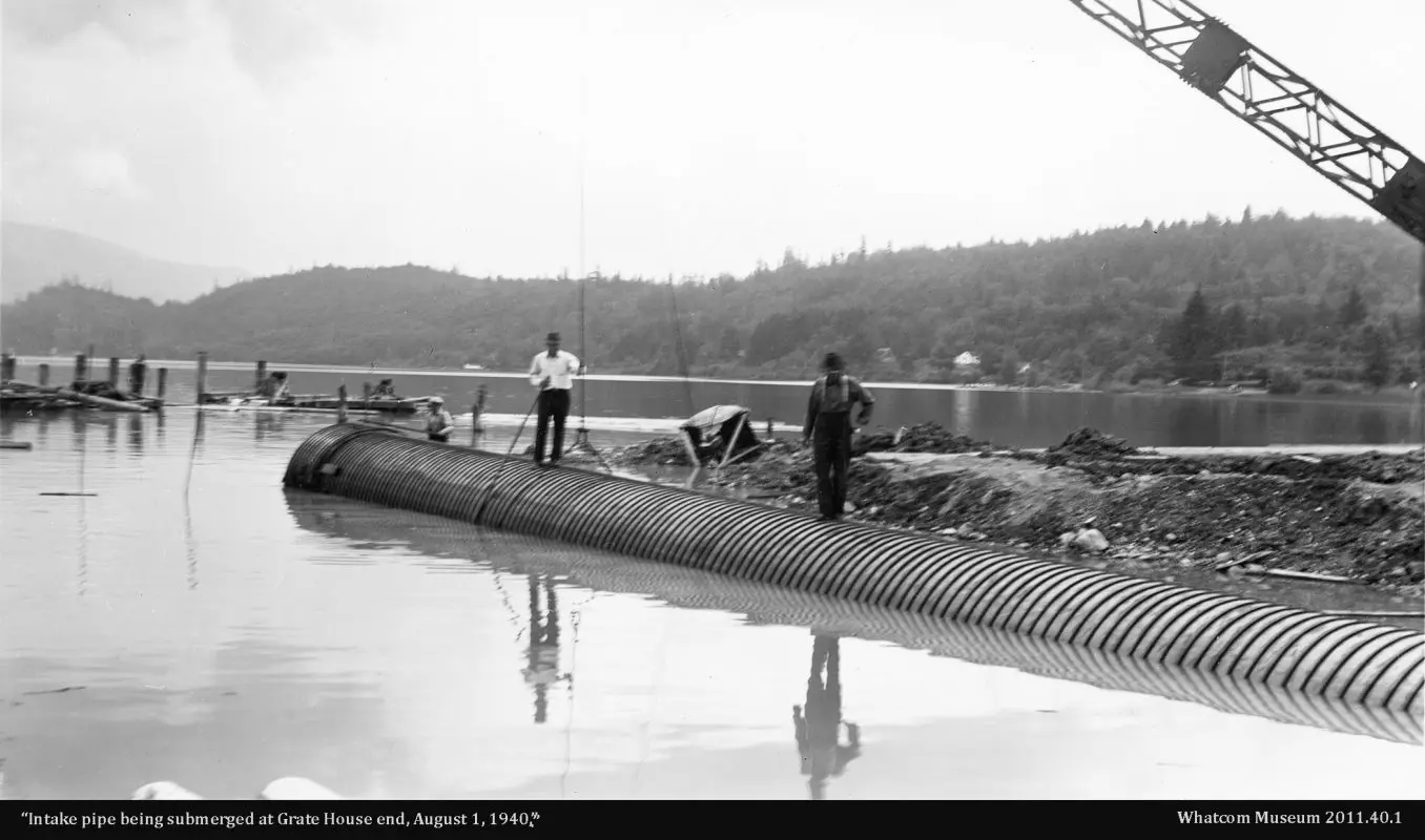 Intake pipe being submerged at the Gate House in 1940.