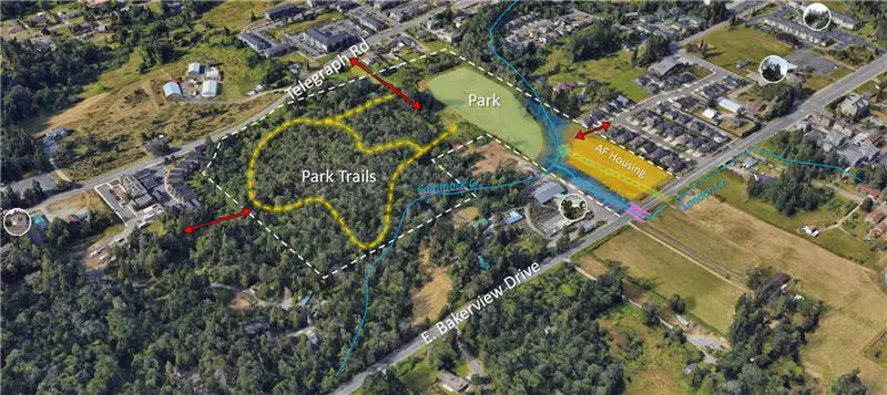 An aerial view of a wooded property with text marking possible future trails