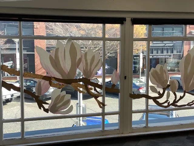 Flower arrangement in window