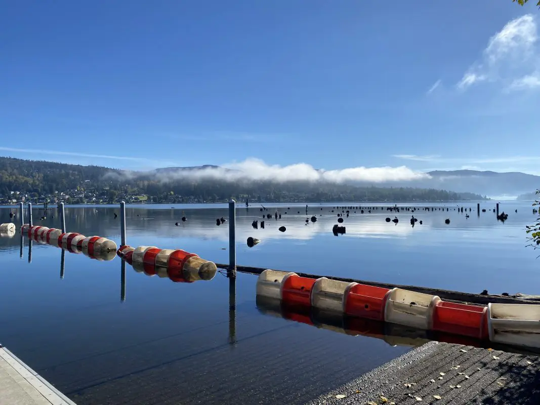A lake boat launch on a clear, sunny day