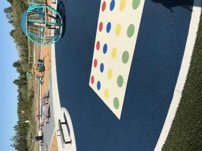 Twister at Cordata Park A Twister board built into the ground at a playground