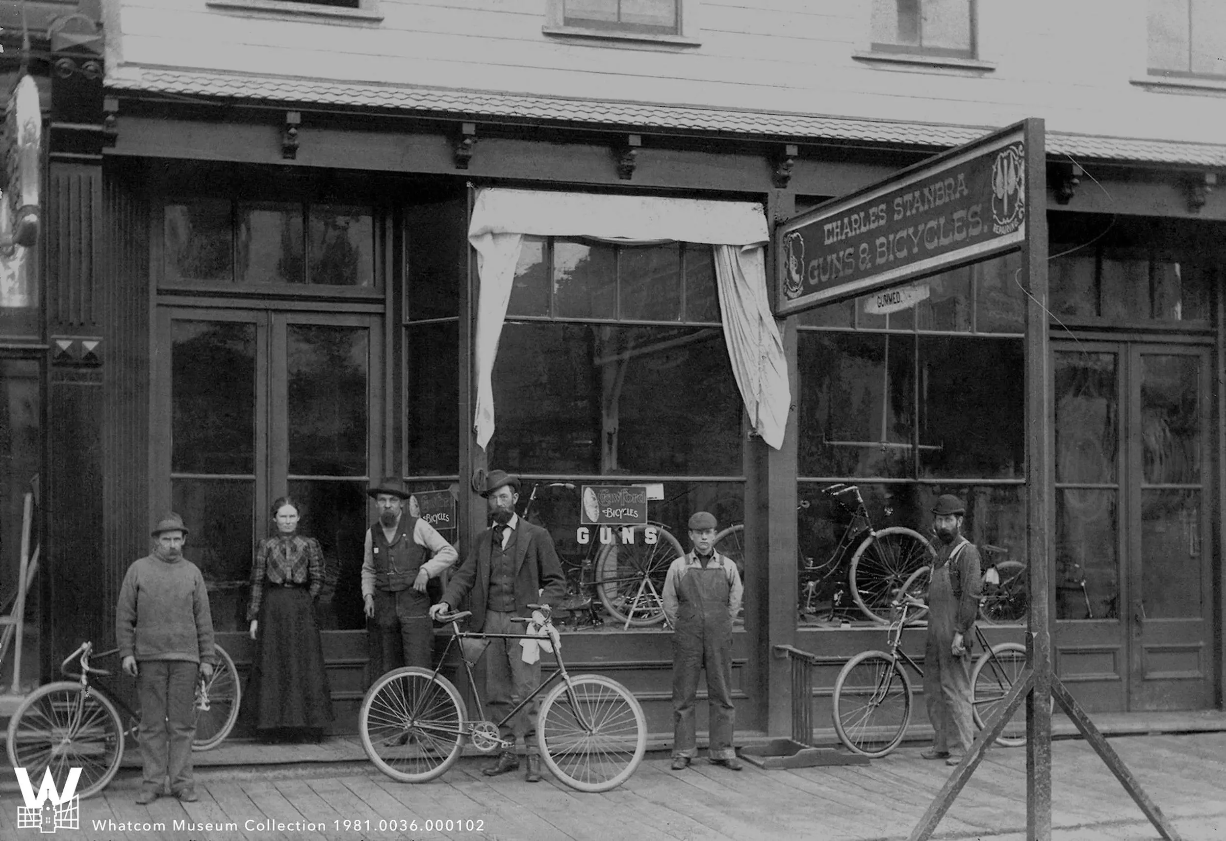 historical photo with people and bikes
