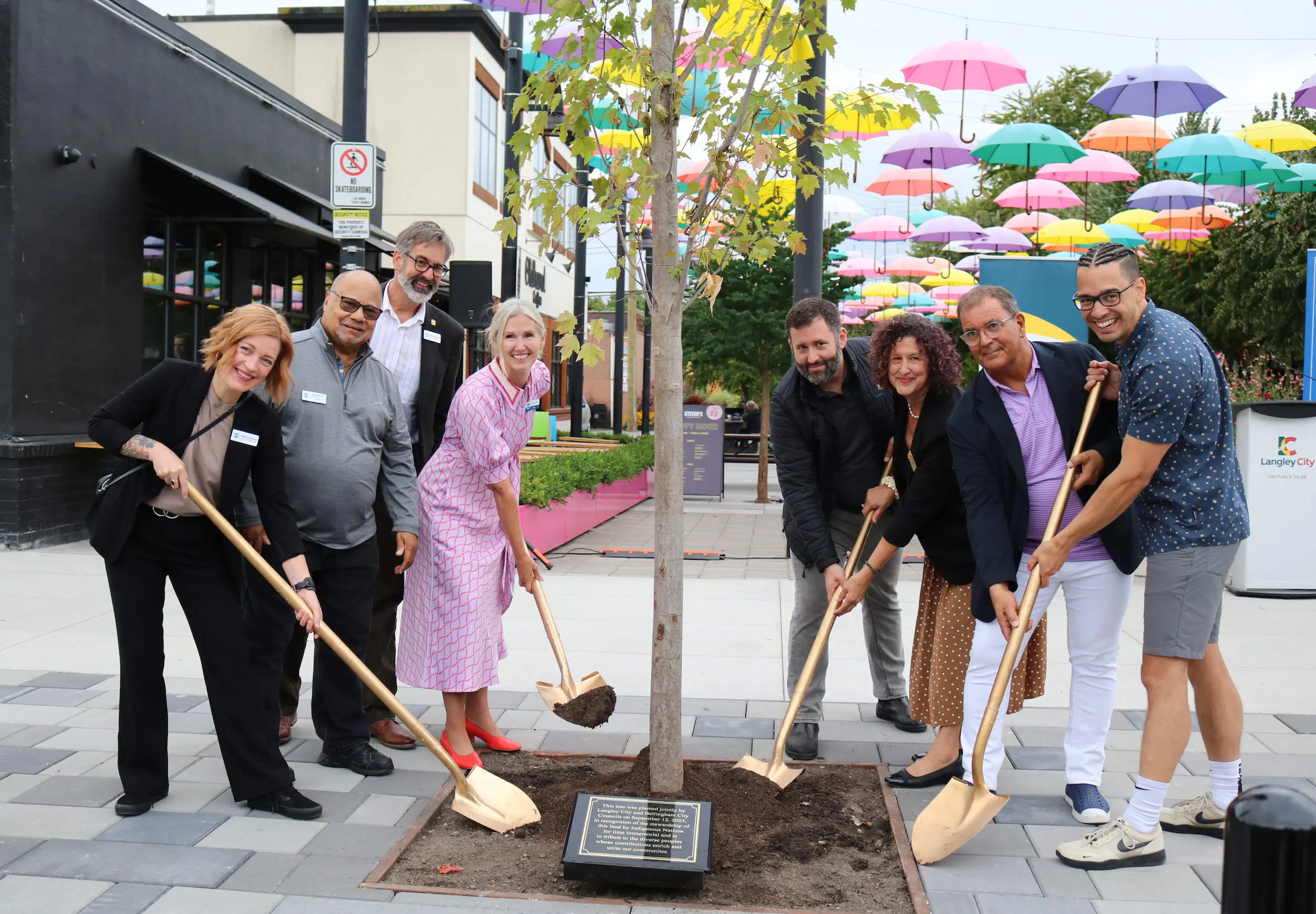People planting a tree
