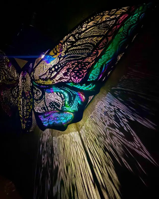 A colorful light-up butterfly sculpture 