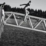 Kids jumping from Taylor Dock into Bellingham Bay.