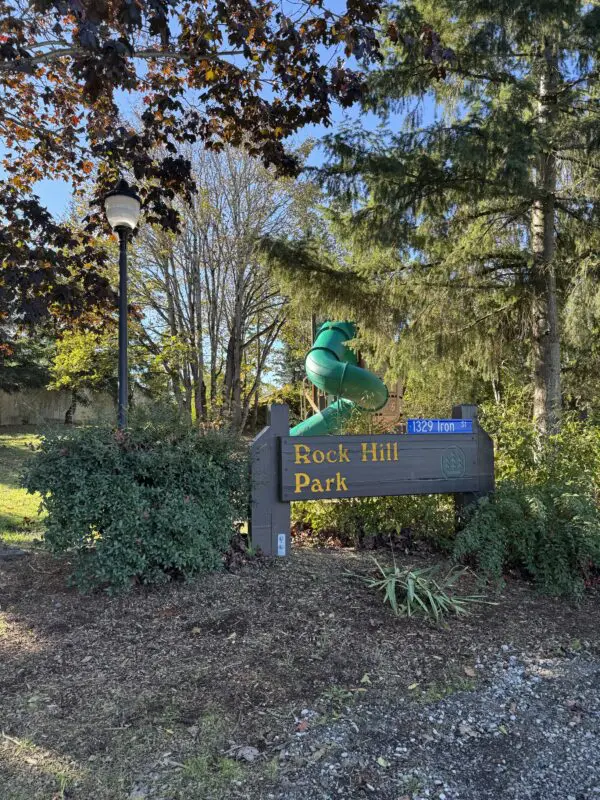 Wooden sign that says Rock Hill Playground