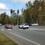 cars at traffic light intersection