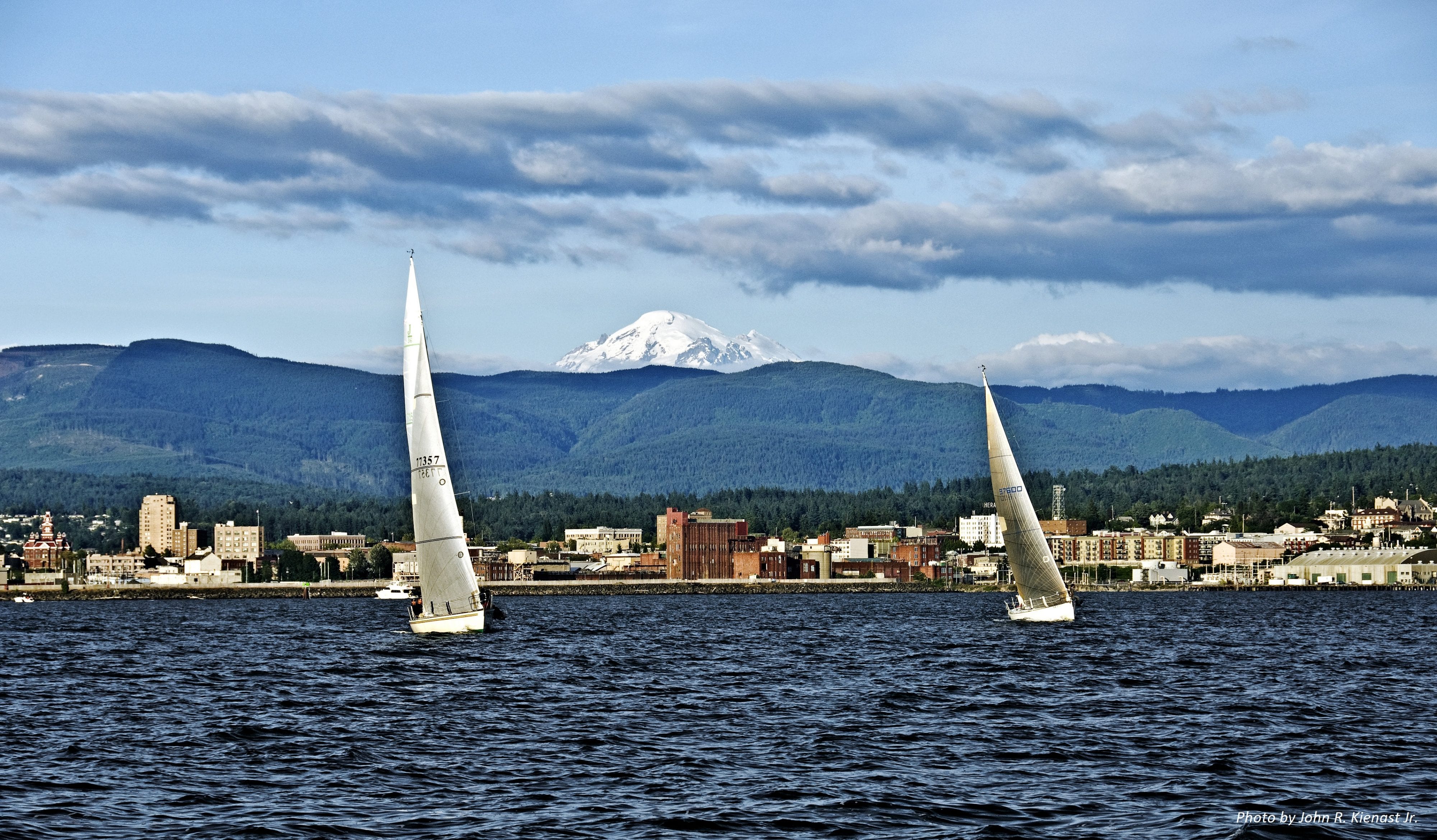 Boats sailing on clear water on Bellingham Bay