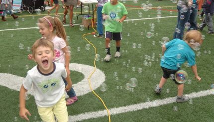 Children playing with bubbles