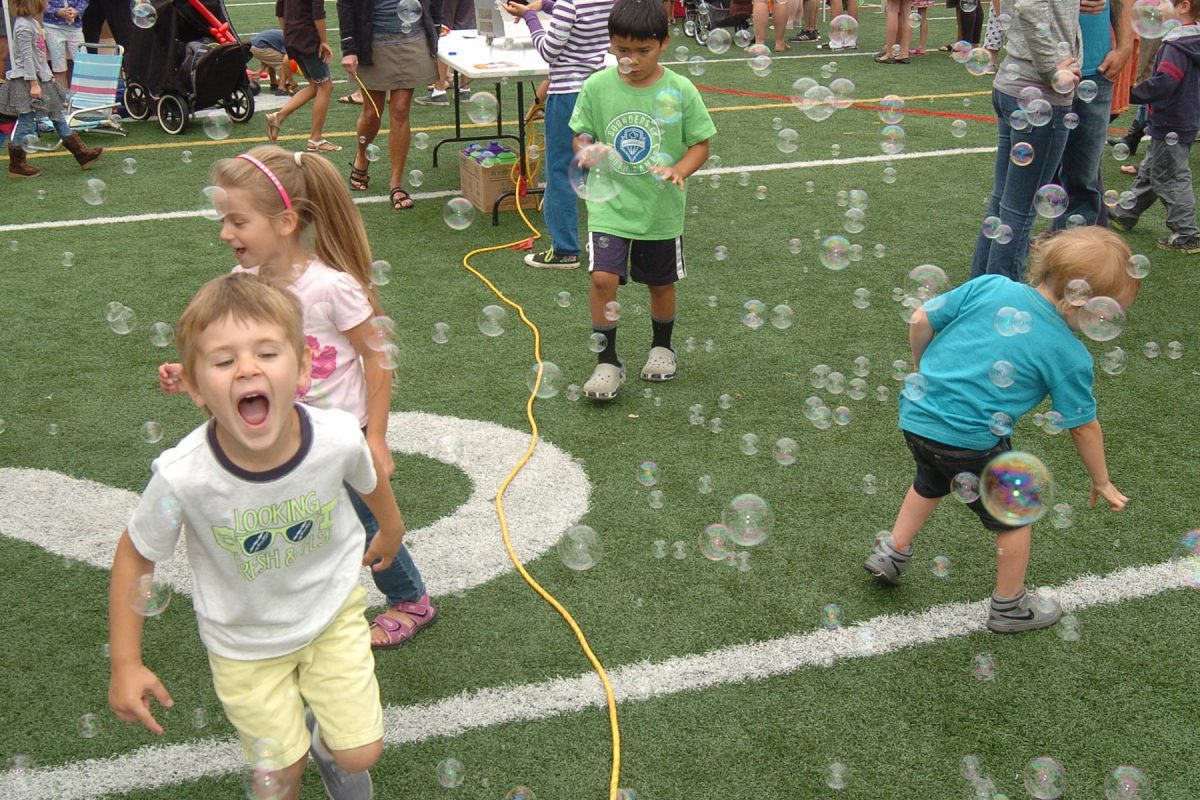 Children playing with bubbles