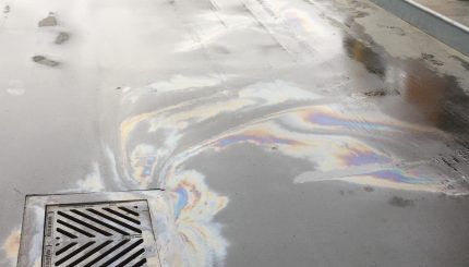 Oil flowing into storm drain