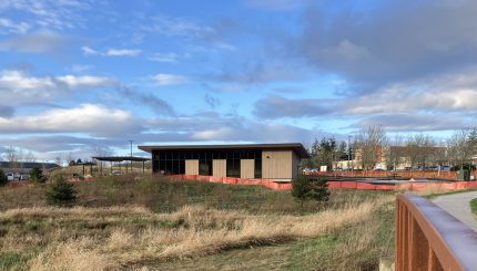 The new pavilion at Cordata Park in the distance, with park open space in the foreground