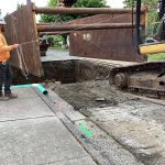 Large structure being lowered underground