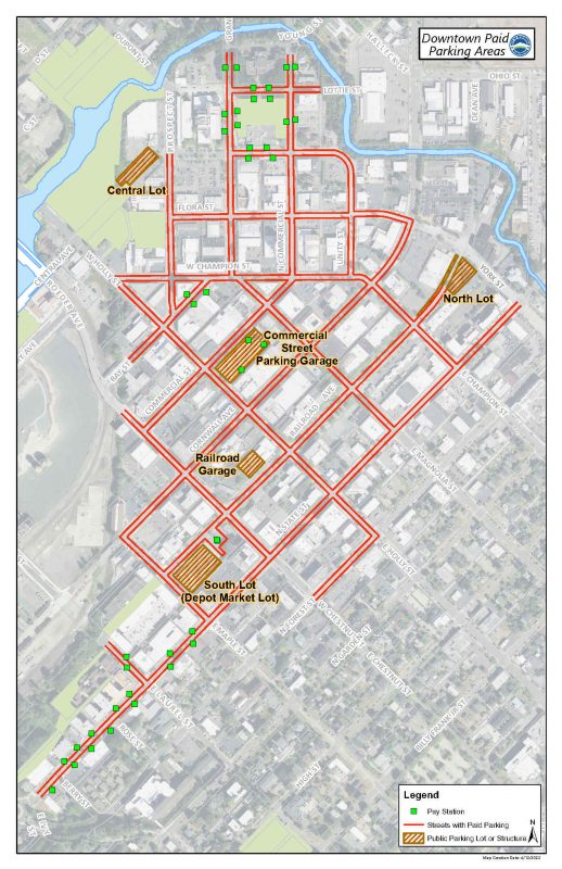 Map of downtown Bellingham with red lines showing where paid parking is and squares to indicate where permit lots are.