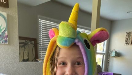 child in unicorn costume