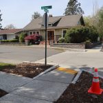 Street and sidewalk intersection of Russell Street and Illinois Street