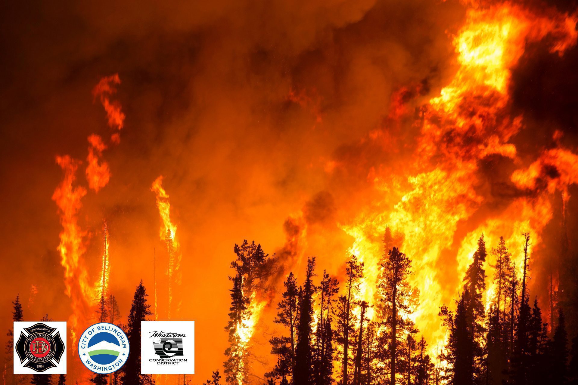 Image showing a forest fire and smoky sky with the Bellingham Fire Department, City of Bellingham, and Whatcom Conservation District logos in the bottom left corner