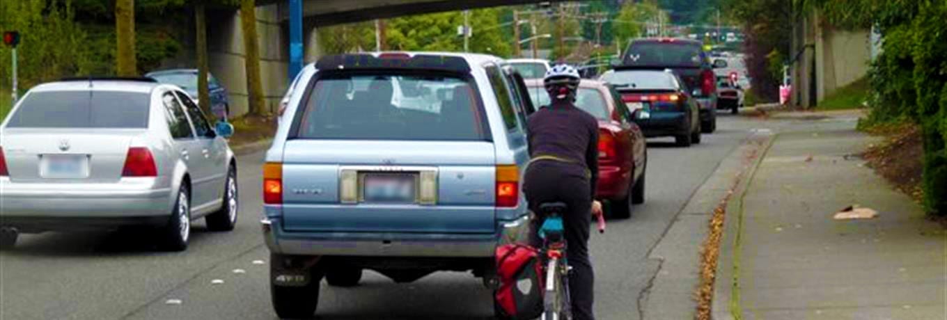 Cars and bicyclists on busy street in Bellingham