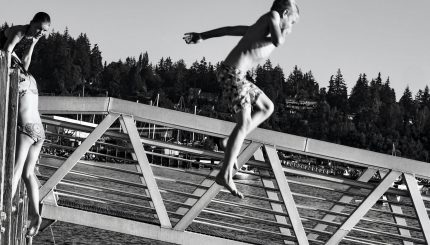 Kids jumping from Taylor Dock into Bellingham Bay.