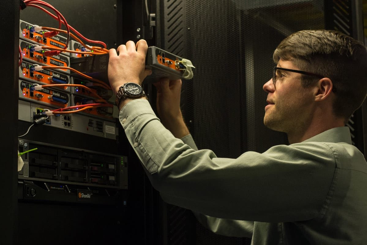 Information Technology staff performing maintenance